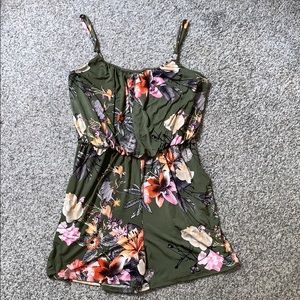 Floral romper. NWOT.
